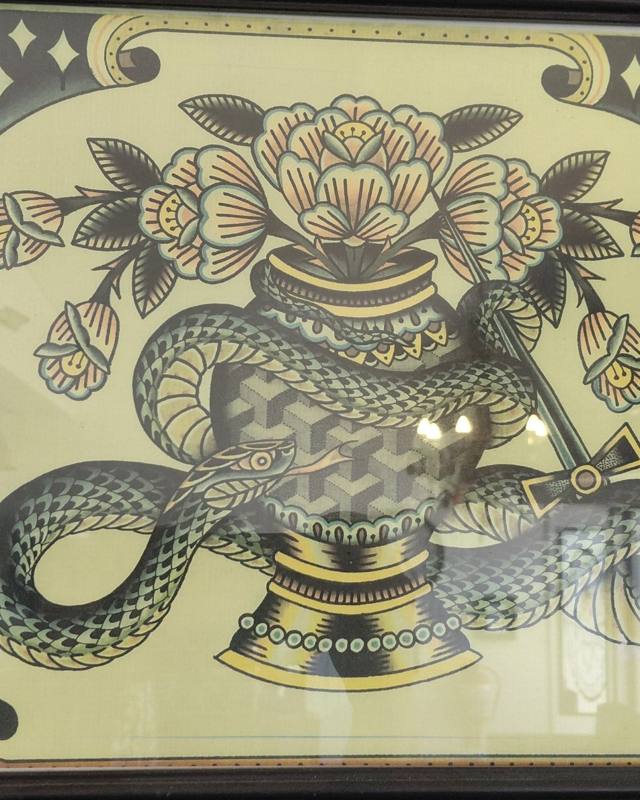 Snake and flower vase